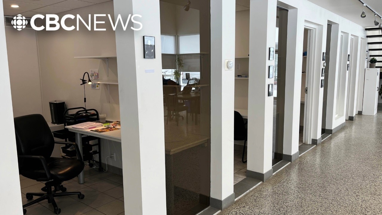 Why are some employers installing heat sensors under work desks?
