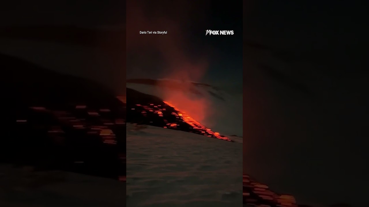 Daredevil skiers take on volcanic mountain slope