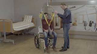 video Demo : l'utilisation du sangle standard avec le Handi-fléau, dans un fauteuil roulant