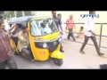 Minister Palle drives auto rickshaw in Puttaparthi