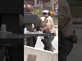 Protesters scuffle with police outside Illinois ICE facility