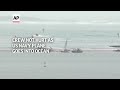 Crew not hurt as US Navy plane overshoots runway, goes into ocean  - 00:27 min - News - Video