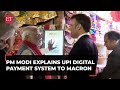 PM Modi explains UPI system to French President Macron outside local shop in Jaipur