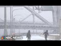 Powerful storm slams Midwest with heavy rain and snow