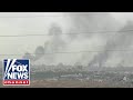 Smoke rises over Gaza despite Israel-Hamas cease-fire