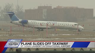 Regional jet slides off runway at St. Louis Airport