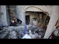 Boy searches through mass of concrete rubble after deadly Israeli strike on central Gaza - 01:02 min - News - Video