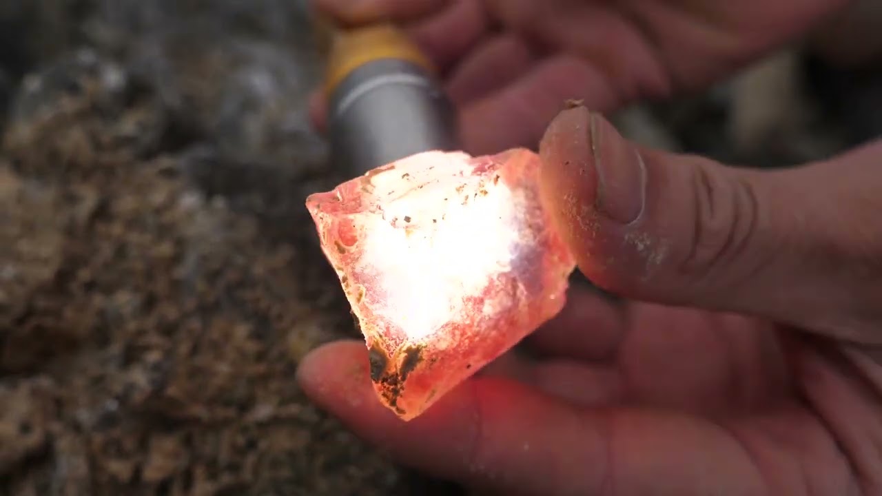Red crystals are formed in volcanic caves by the sea. Gems, diamonds