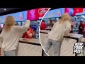 Woman throws food, spits at McDonald’s employees, shocking visuals