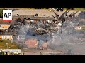 Police say suspect drove car into Michigan church, carried out deadly shooting, set building ablaze