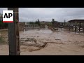Flash floods due to unusually heavy seasonal rains kill dozens in Afghanistan