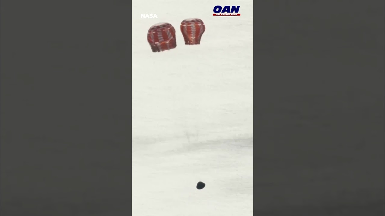 NASA: Orion's main parachute has deployed as the Artemis II crew splashes down to earth.