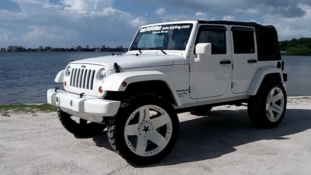 All white four door jeep #2