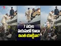 Watch: Chandrababu climbing up the caravan to deliver speech 