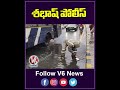 Traffic Police Clear Waterlogged Road By Unclogging Drain | KPHB | V6 News  - 00:58 min - News - Video