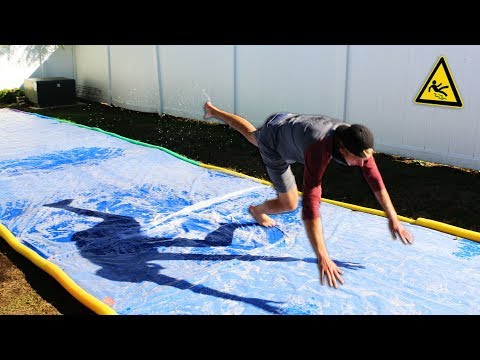 DONT Slip on the Slippery Platform!! (GIANT SLIP N' SLIDE CHALLENGE)