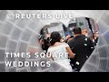 LIVE: New Yorks Times Square hosts weddings, surprise proposals