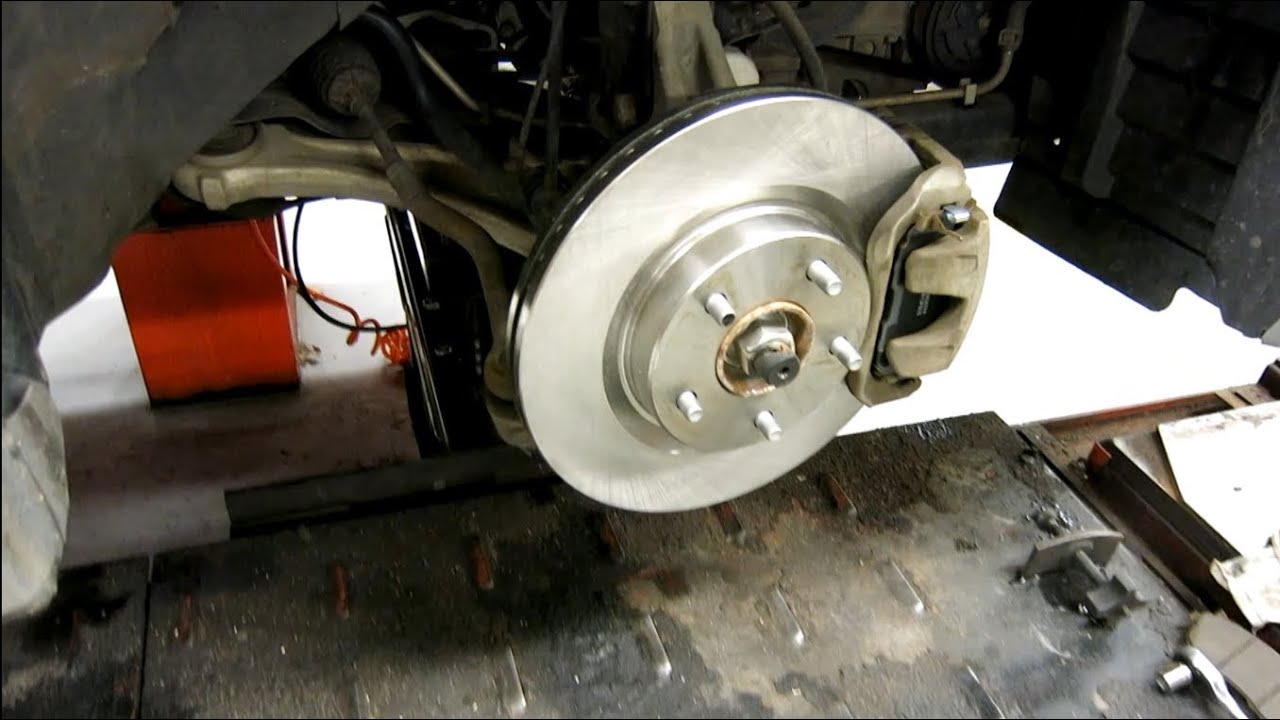 Change brake pads rotors nissan altima #3