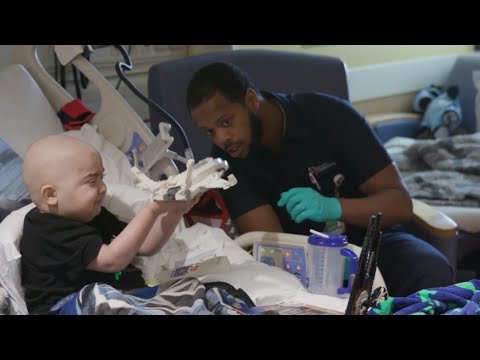 Although KJ Upshaw’s official job title at Cincinnati Children’s is floor tech in Environmental Services, he refers to himself simply as the housekeeper. For two little boys in the medical center’s Bone Marrow Transplant unit, KJ is much more. He’s a cherished friend who helped make their lives in the hospital brighter and more fulfilling. Although KJ Upshaw’s official job title at Cincinnati Children’s is floor tech in Environmental Services, he refers to himself simply as the housekeeper. For two little boys in the medical center’s Bone Marrow Transplant unit, KJ is much more. He’s a cherished friend who helped make their lives in the hospital brighter and more fulfilling.