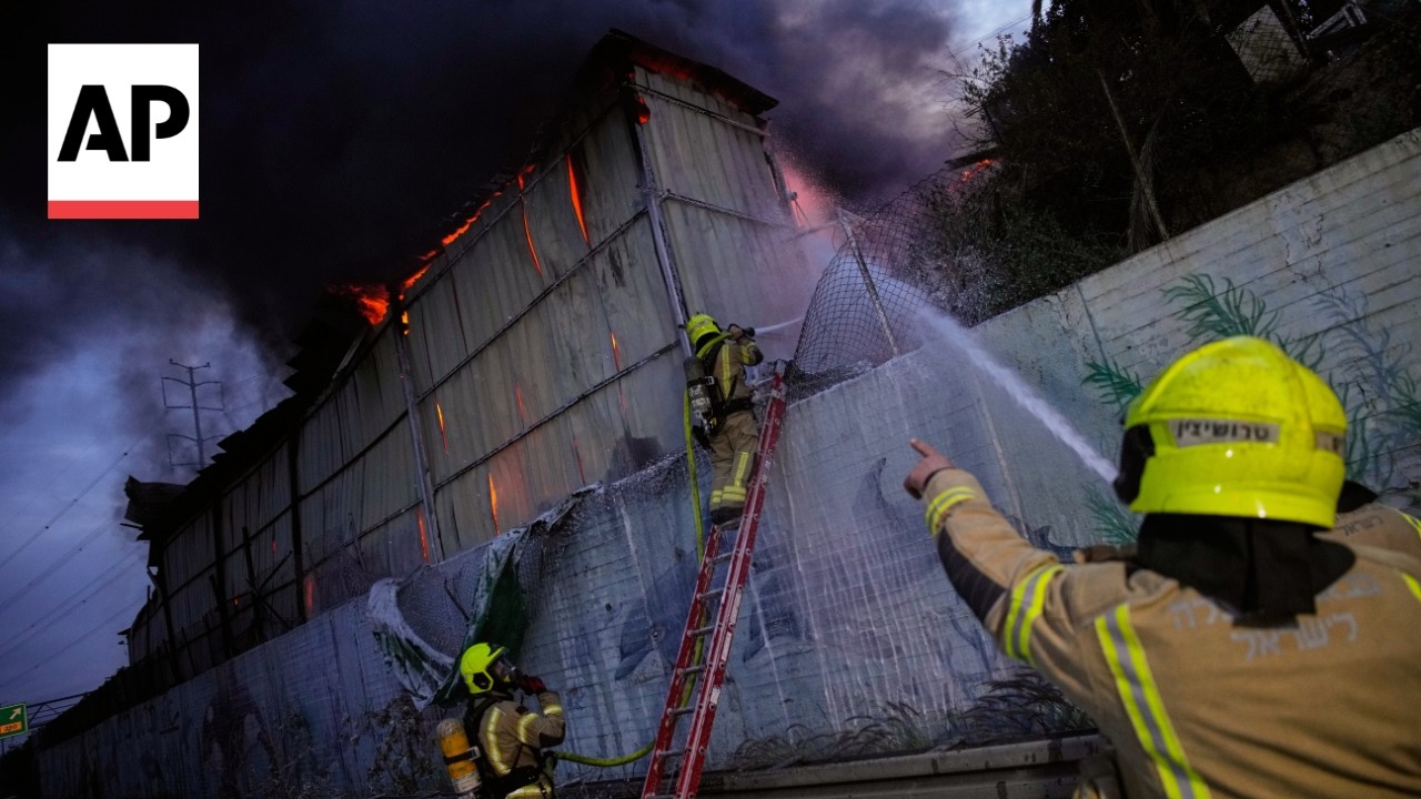 AP reporter shows scene in Holon after missile strikes site in Israel