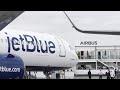 US judge blocks JetBlue-Spirit Airlines merger | REUTERS