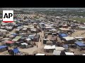 Palestinians live in tents and search for food as Israel attacks Rafah