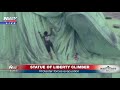 Woman arrested for climbing Statue of Liberty