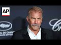 Kevin Costner prefers writing to posing