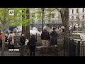 Person rushed away on stretcher after fire extinguished outside Trump hush money trial  - 01:17 min - News - Video