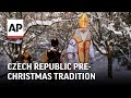 St Nicholas leads parade through snowy Czech villages in pre-Christmas tradition