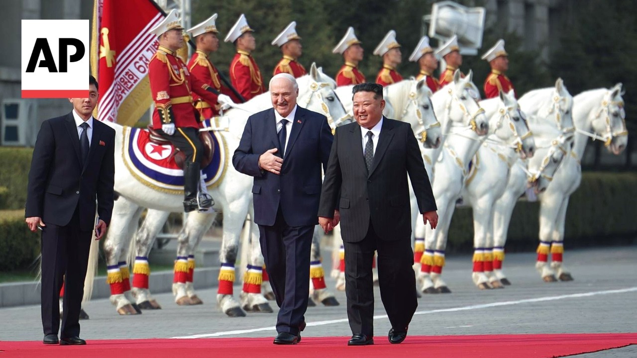 Kim Jong Un greets Belarus' Lukashenko as he arrives in North Korea