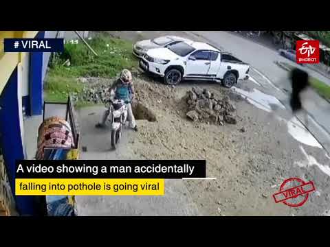 Shocking!! Pothole swallows man along his bike in parking space