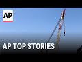 Giant crane arrives in Baltimore to begin debris removal | AP Top Stories