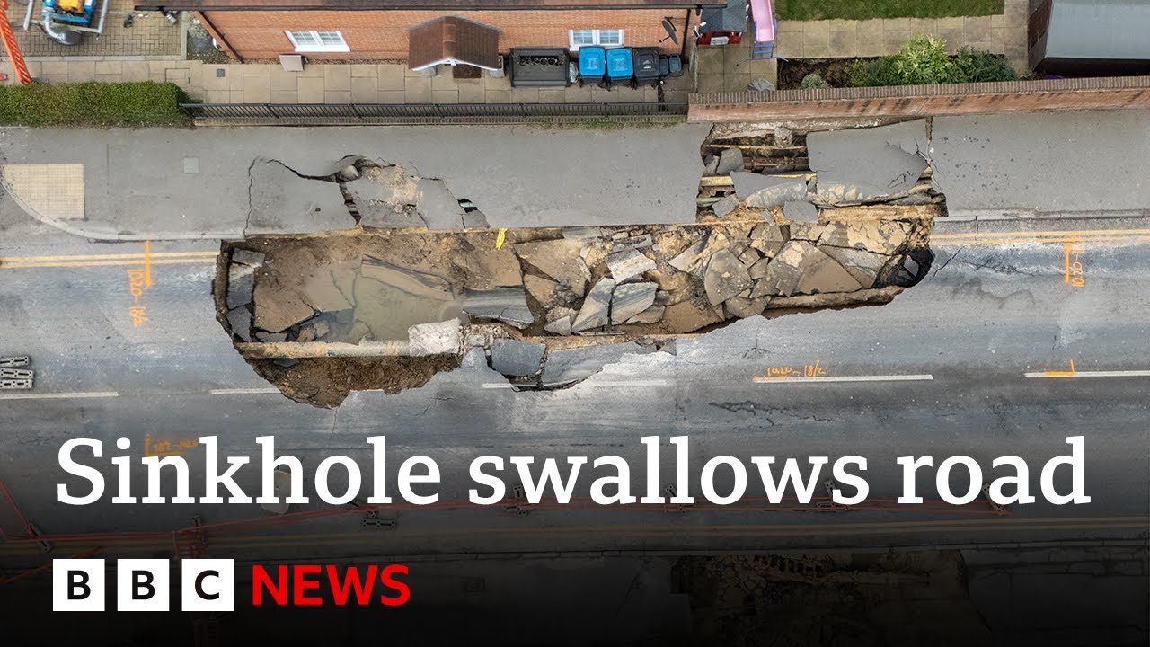 Major incident declared over sinkhole swallowing up UK street | BBC News