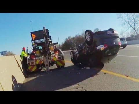 Driver screams as tow truck flips car with him still inside Driver screams as tow truck flips car with him still inside