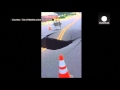 Moment 20-feet deep sinkhole opens up in California road