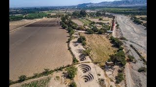 Flying over the Cantalloc Aqueducts Nazca, Peru - 4k