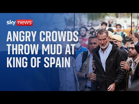 Angry crowds hurl mud and insults at King of Spain as he visits town devastated by floods
