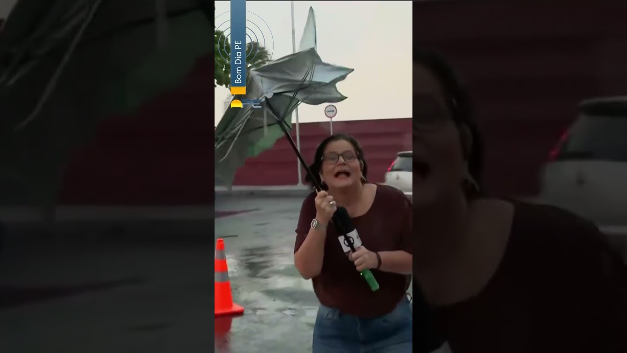 Repórter cai na gargalhada com guarda chuva destruído ao vivo pelo vento shorts bastidores