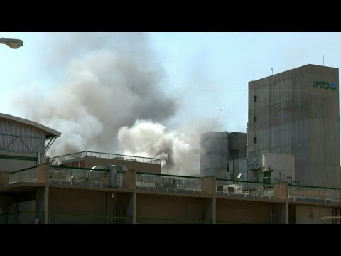 Smoke billows at site of Iranian strike on hospital in Israel's south | AFP