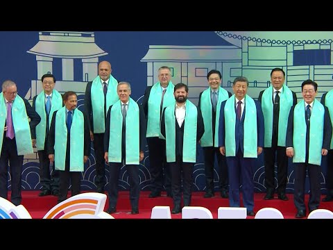 Xi, Carney and other APEC leaders pose for family photo | AFP