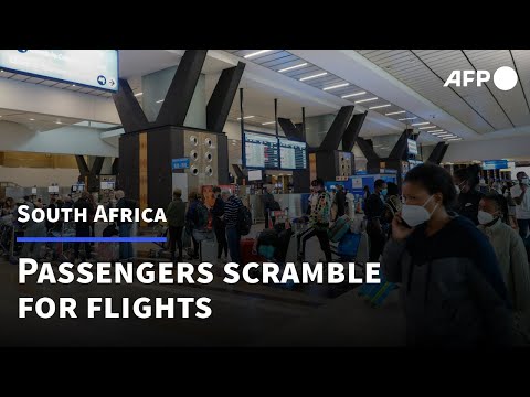 Passengers scramble for flights out of South Africa | AFP
