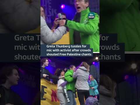 Greta Thunberg tussles with activist over mic after crowd begins shouting Free Palestine chants