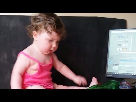 Cute Baby At Dad's Working Table - It's Funny