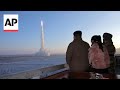 North Koreas Kim and daughter watch long-range missile test