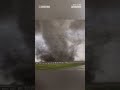 Cars drive by tornadoes tearing across Texas and Nebraska  - 01:00 min - News - Video