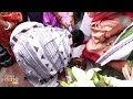 Santhal community members wash feet of Odisha CM-designate and Dy CMs-designate in Bhubaneswar
