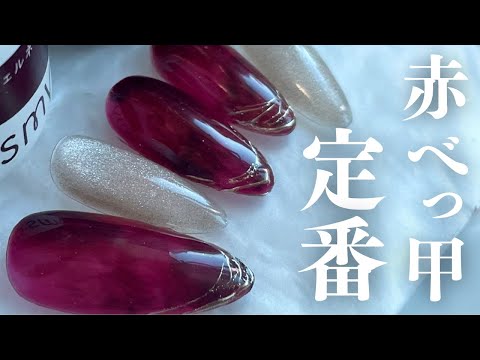 定番の赤べっ甲はシアーなレッドにブラウンを重ねて💅