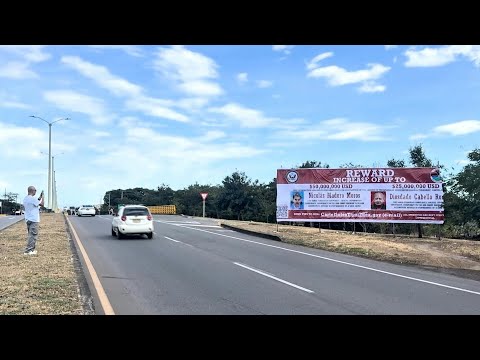 Billboard with a reward for Venezuelan President Maduro appears on a highway | AFP