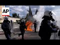 Greek police clash with protesters outside parliament